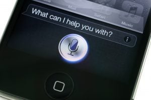 "Hong Kong, China - November 11, 2011: Apple iPhone 4s Siri. Siri is an intelligent personal assistant which works as an application for Apple's iOS."