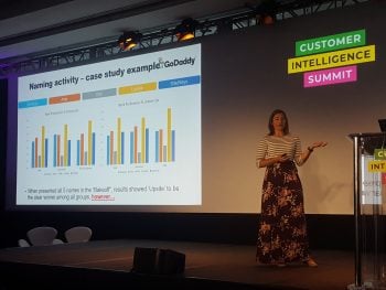 GoDaddy UX Research Director Cassie Mally, speaking at the Vision Critical Customer Intelligence Summit