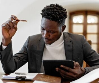 young african american man learning how to increase email marketing ROI